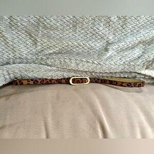 Leopard print women’s belt with gold clasp. Size small. Used, good condition.